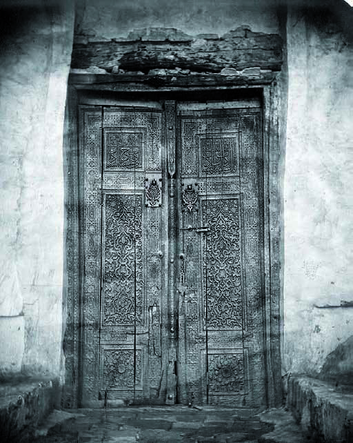 Mausoleum of Khoja Ahmed Yasawi. Carved wooden doors of the main entrance. Photo from Turkestan Album. 1871