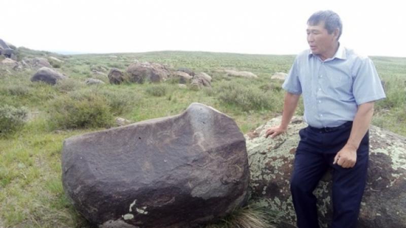 Күршімдегі таңбалы тастардың сыры